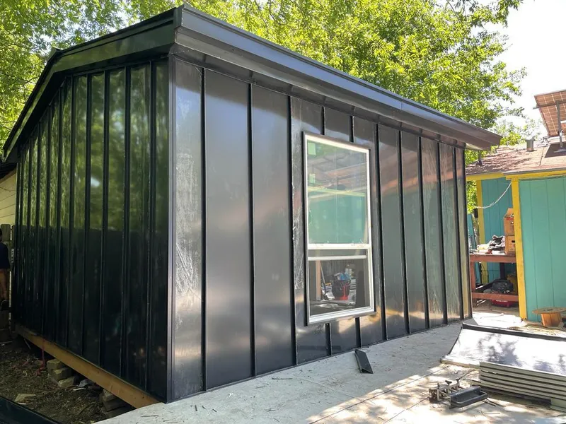 Black standing seam metal wall panels for Roof Inspection in Dunwoody